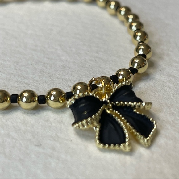 Gold Beaded Bow Bracelet - Picture 1 of 11
